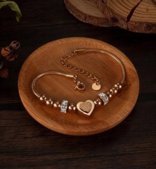 Bransoletka złota z sercem i cyrkoniami